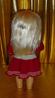 Кукла говорящая  в красно-белом платье